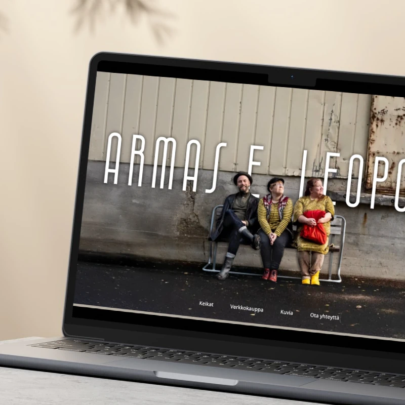 Armas E Leopoldin verkkosivusto kannettavan tietokoneen näytöllä